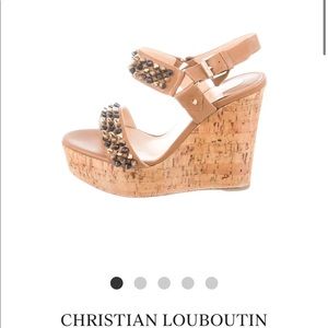 CHRISTIAN LOUBOUTIN
Leather Studded Accents Sandals